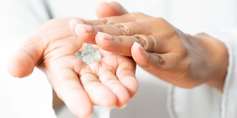 Person-using-hand-sanitiser-to-clean-hands