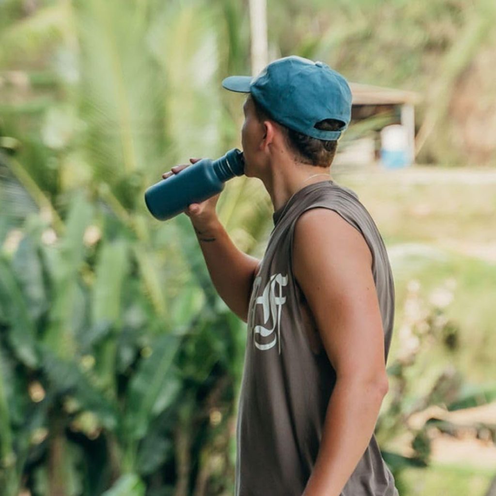 One-Green-Bottle-Botl-500ml-Tough-Canteen-Lifestyle-Man-Drinking-From-Bottle-Closeup