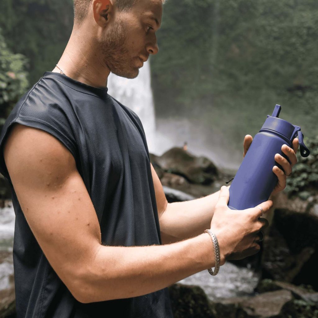 One-Green-Bottle-Botl-Epic-Bottle-700ml-Man-Holding-Bottle-Near-Waterfall